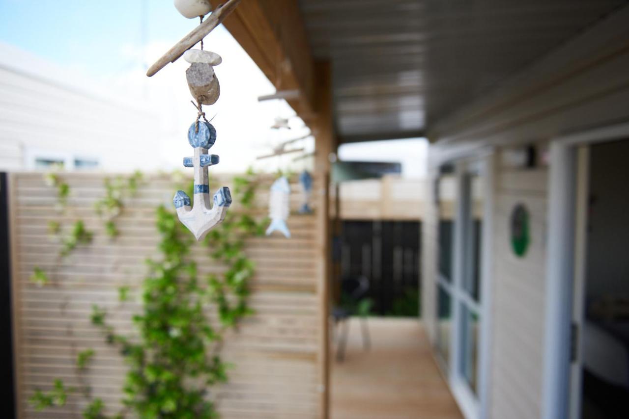 Orewa Kiwi Cabins Bagian luar foto