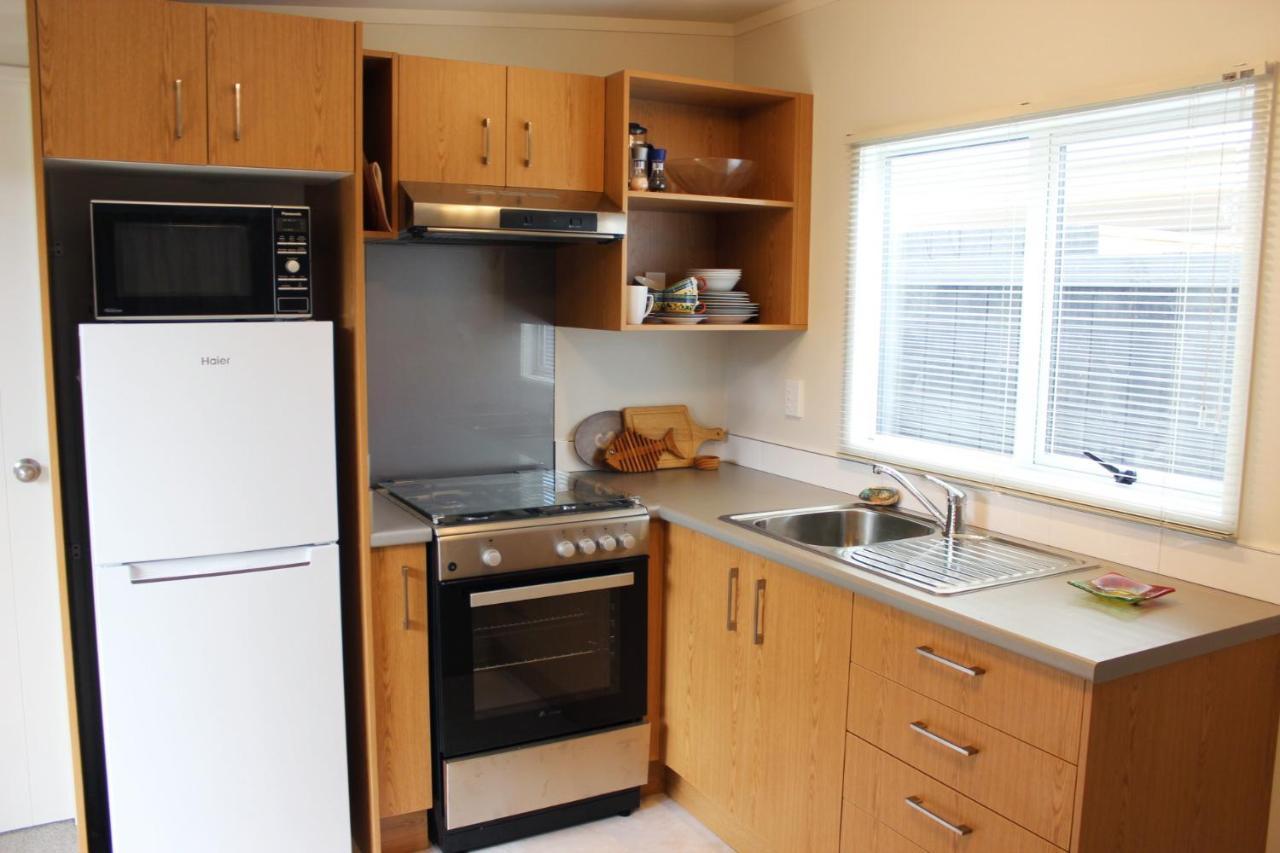 Orewa Kiwi Cabins Bagian luar foto